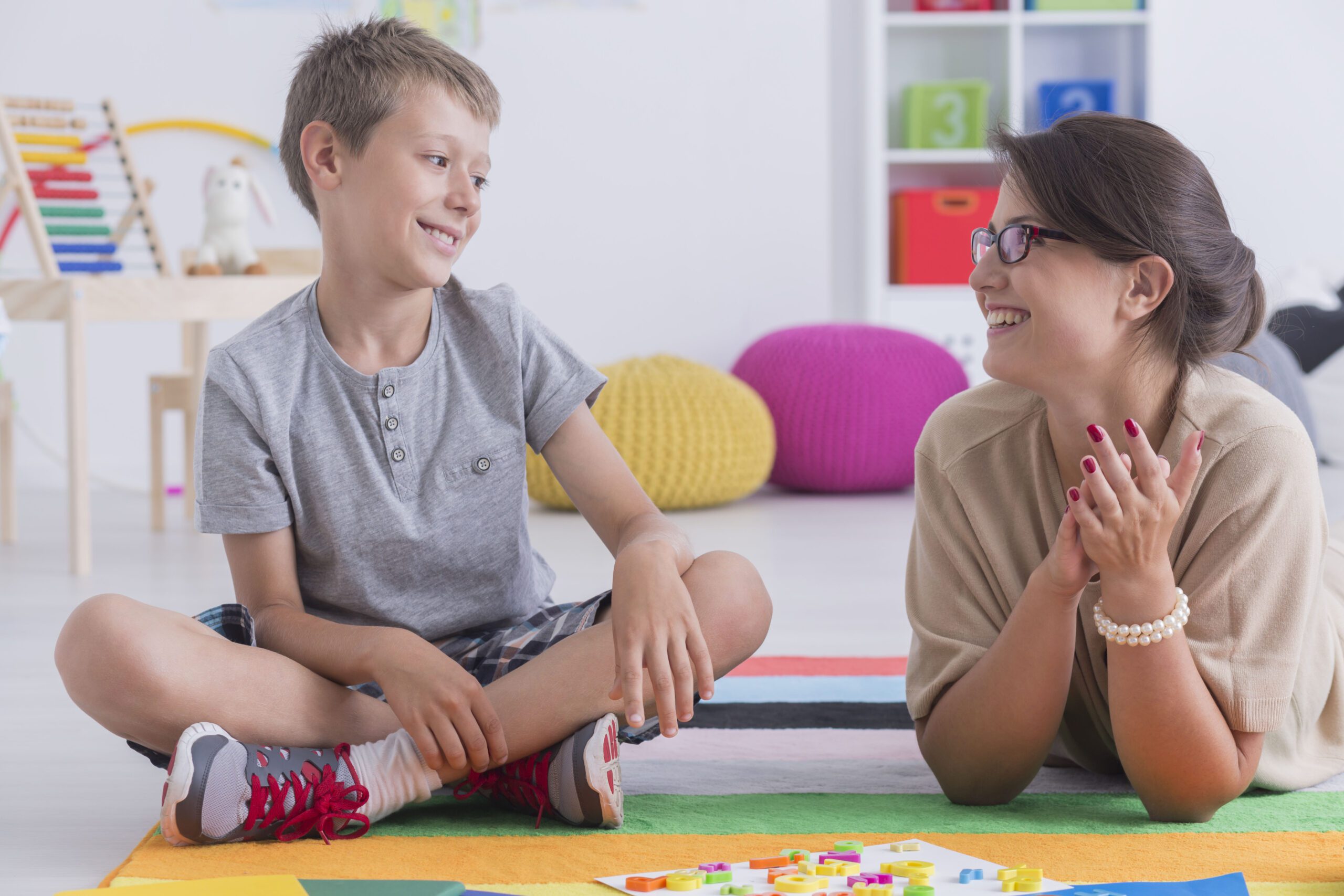 student having therapy with a child