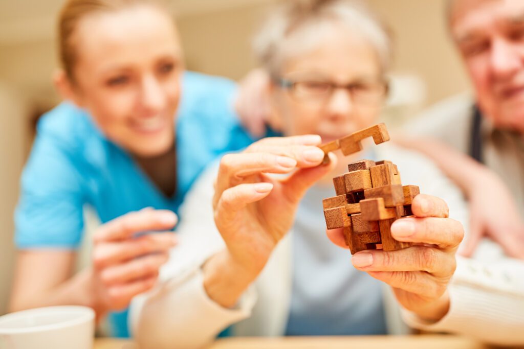 an occupational therapist with a senior patient