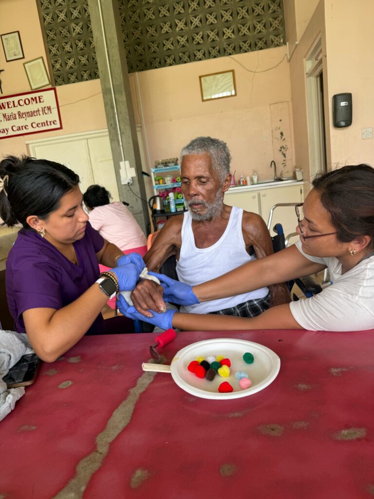 People work together on a tabletop activity.